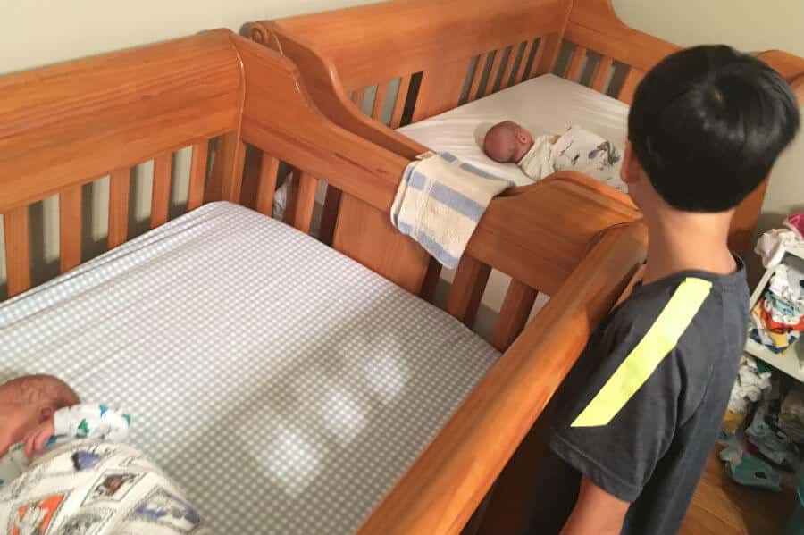 Meeting new twin cousins, a free car seat, funeral preparations, and a Thomas Merton quote (7 Quick Takes)