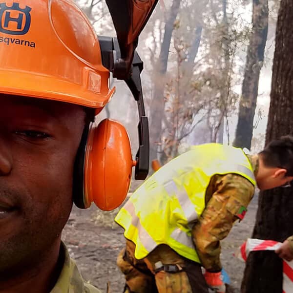 Priests swap clericals for camouflage to help fight Australian fires