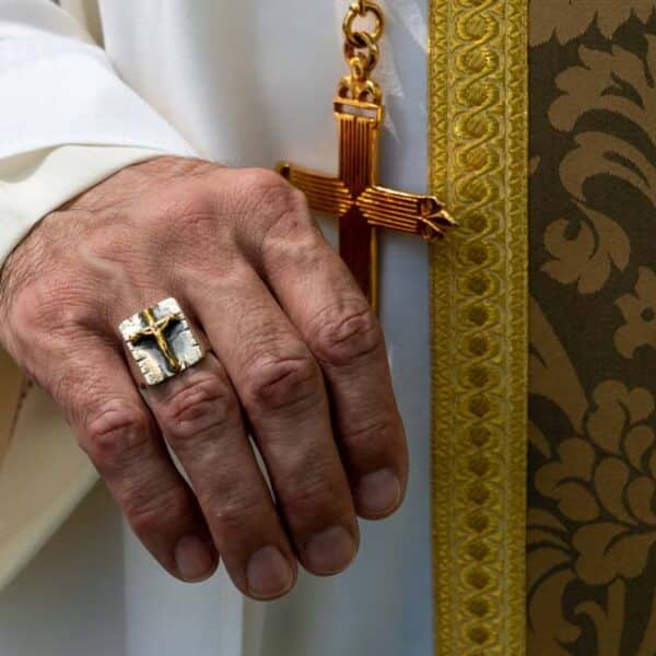 Bishop-designate Lewandowski’s insignia denote his office, commitment