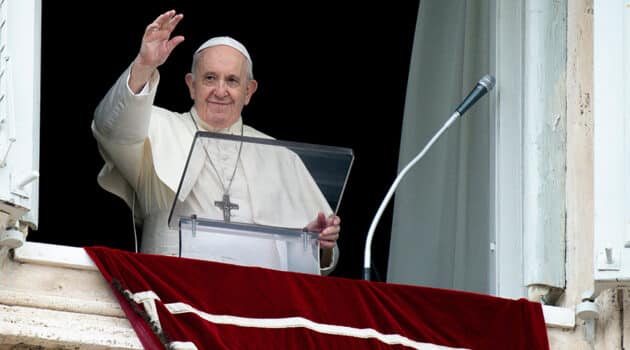 Pope Francis greets the crowd.