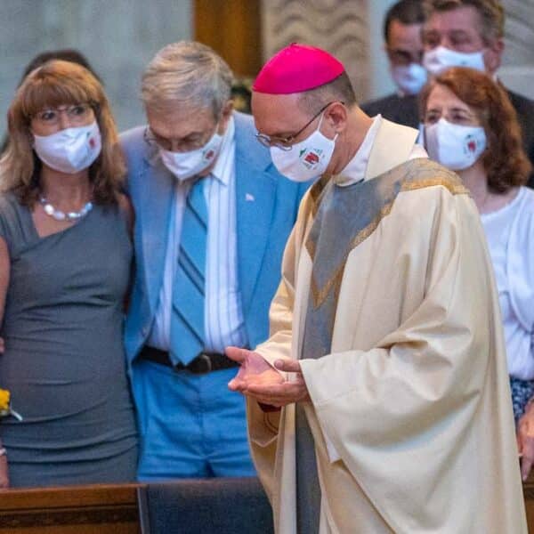 Family, friends go the distance for Bishop Lewandowski