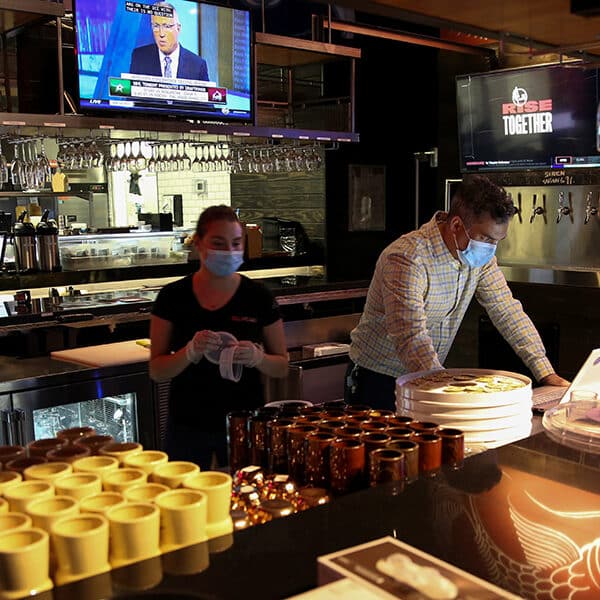 People in Miami work at a restaurant