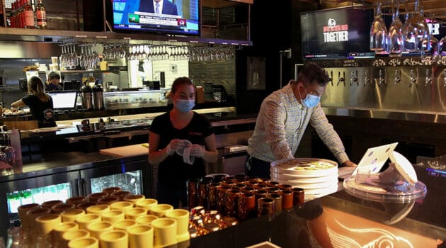 People in Miami work at a restaurant