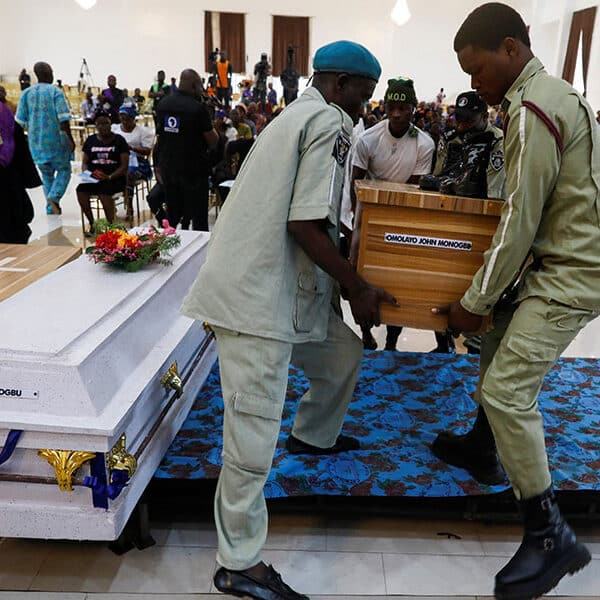 Nigerian priest says he shielded parishioners like chicks during massacre