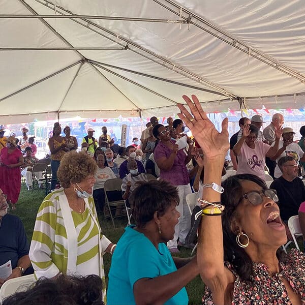 Mass on the Grass draws crowd to St. Ambrose