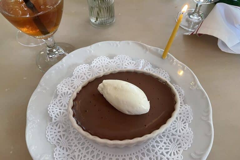 Plate of chocolate mousse on a doily