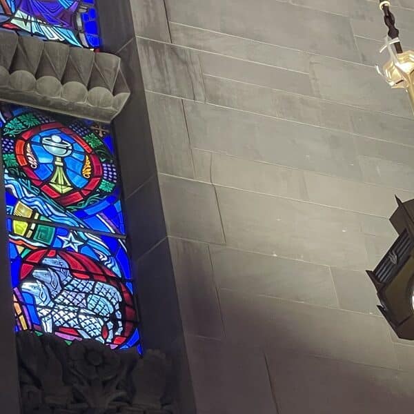 Stained glass image showing the Eucharist