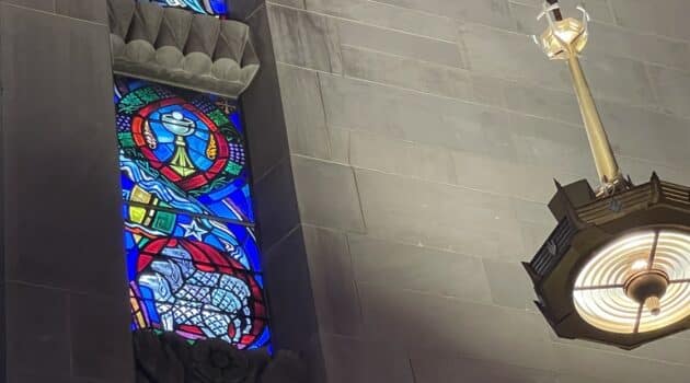 Stained glass image showing the Eucharist