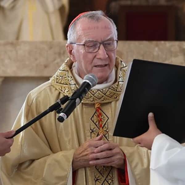 Taxes should fund solidarity at home and abroad, Cardinal Parolin says