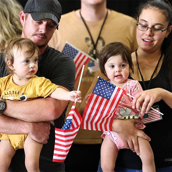 Catholic Charities tasked with Afrikaner travel fees as Trump keeps other refugees in limbo