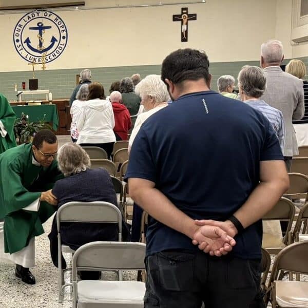 Hope rises from ashes for St. Rita parishioners
