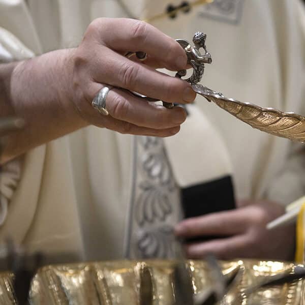 Question Corner: In families involved in occult practices, does baptism free their infants from such things?