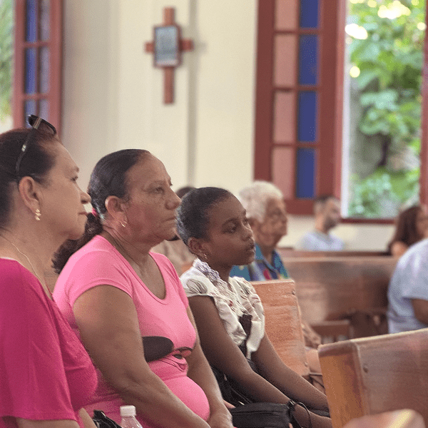 Churchgoers listen during Mass