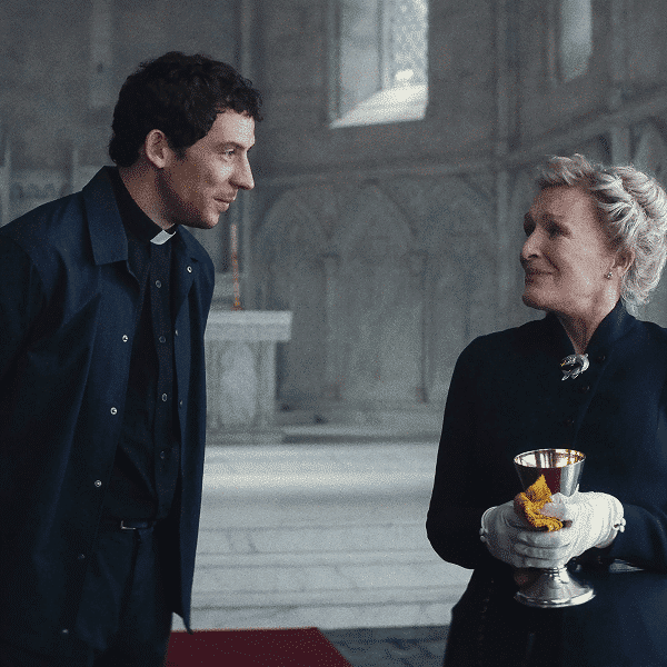 Josh O'Connor and Glenn Close star in a scene from the movie. "Wake Up Dead Man: A Knives Out Mystery."