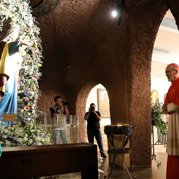 Cardinal Pizzaballa prays in the cave where Jesus stopped with his mother