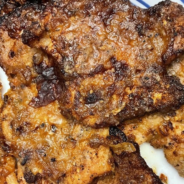 Cooked pieces of chicken on a plate