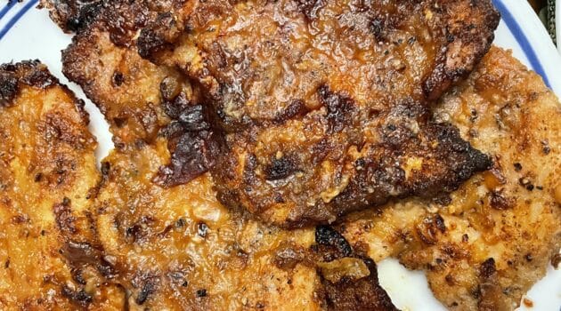 Cooked pieces of chicken on a plate