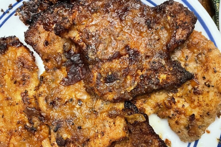 Cooked pieces of chicken on a plate